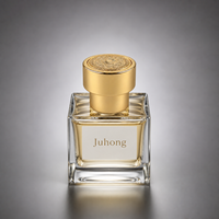 Tapa de perfume de lujo en aleación de zinc dorado pulido, cilíndrica de dos niveles con relieve en la parte superior, cubierta para botella con logotipo personalizado para botella de perfume.