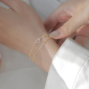 Pulsera CANNER Simple S925 de Plata de Ley con Doble Corazón y Cadena Rollo Chapada en Oro de 14k/18k, Regalo para Chicas - Product Image 4