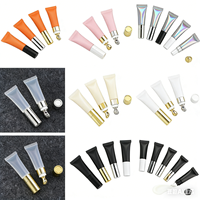 Emballage de baume à lèvres 10ml avec logo personnalisé et applicateur en métal Fond de teint vide en PE Brillant à lèvres Crème pour les yeux Tube à presser de luxe