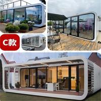 Petite maison conteneur modulaire préfabriquée mobile à structure en acier personnalisée en usine Cabine Apple préfabriquée de luxe pod hôtel sur roues t