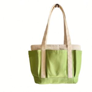 Bolsa de mano con tres bolsillos externos, bolsa de compras reutilizable de poliéster, cierre con cremallera superior, artículos esenciales para el día a día - Product Image 1