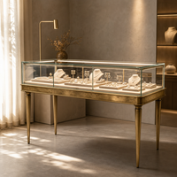 Comptoir de présentation de bijoux vintage en or antique sur mesure avec plateau en verre pour magasin de bijoux en gros