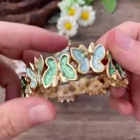 Nouvelle mode de luxe Bracelet en alliage polyvalent pour femmes Style frais peinture à l'huile coloré papillon volant bracelets élastiques