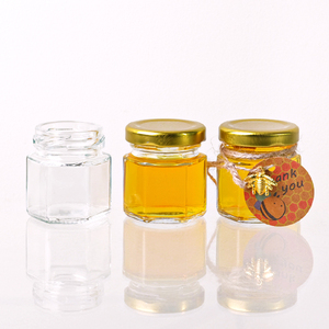 Top Grade 25ml 35ml 45ml hình lục giác Glass mật ong Jar với nắp kim loại - Product Image 1