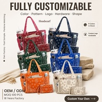 Sac fourre-tout matelassé léger en duvet avec broderie personnalisée du logo OEM et imprimé cachemire, idéal pour les trajets quotidiens