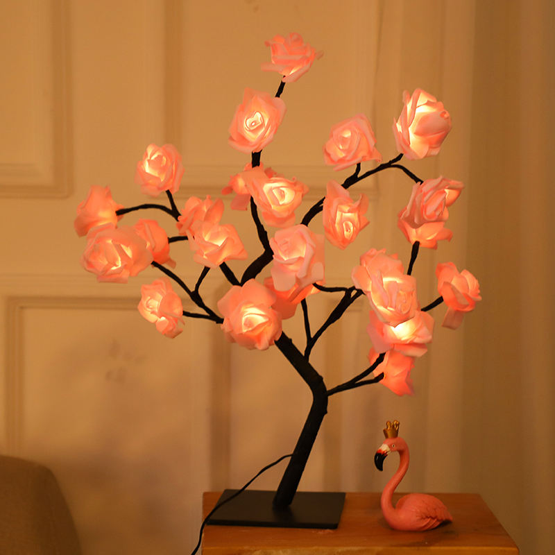 Tronc noir avec fleurs roses