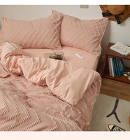 Ensemble de housse de couette tuftée style bohème, motif chevron zigzag texturé, en coton rose doux, avec taies d'oreiller