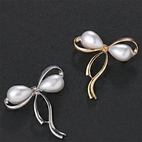 Broches en alliage de galvanoplastie avec nœud en diamant pour femmes, plaqué or, perle, perle, plaqué argent, les plus populaires