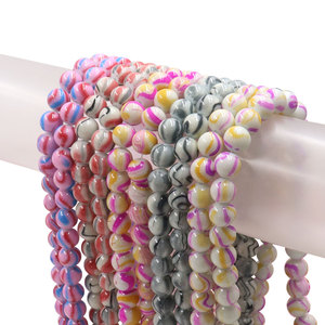 Venta al por mayor 10mm Color caramelo cuentas de vidrio de mármol con agujero para la fabricación de joyas y proyectos decorativos de bricolaje Stock para la venta - Product Image 1