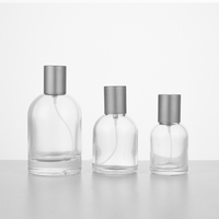 Vente en gros Bouteille de parfum de luxe 50 ml 100 ml Flacons vaporisateur de parfum vides à bouchon argenté transparent
