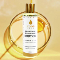 Huile pour le corps éclaircissante et illuminante FDOB SKIN 200 ml, flacon ambré, formule nourrissante, complexe de vitamines C et E, sans hydroquinone, citron