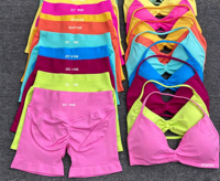 Ensemble de yoga et de fitness personnalisé pour femmes, respirant, uni, sans couture, en spandex/nylon, soutien-gorge de sport et short, effet push-up, ensemble de vêtements de sport 2 pièces