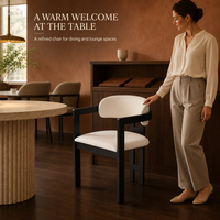 Fauteuil à cadre noir avec assise et dossier rembourrés crème pour la restauration, les hôtels, les salons, collection de meubles d'intérieur