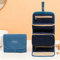 Trousse de Toilette de Voyage Suspendue avec Compartiments Amovibles Grande Capacité Imperméable pour Cosmétiques et Soins de la Peau Organisateur de Maquillage