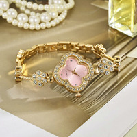 Montre à quartz trèfle à quatre feuilles à la mode classique avec bracelet en diamant pour femme