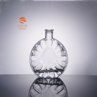Bouteille en verre cristal ronde de 700 ml avec bord perlé, idéale pour le brandy, le whisky et les emballages cadeaux haut de gamme