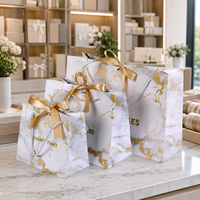 Sacs cadeaux en papier à motifs en stock avec nœud en ruban – Emballages de luxe pour boutiques, cadeaux, mariages et fêtes
