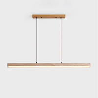 Lustre long suspendu en travertin naturel, style bois naturel moderne et simple, pour escalier ou restaurant.