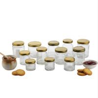 Vente flash Mini pot en verre rond vide de 30 ml 50 ml pour confiture, miel, aliments, épices avec couvercle en métal à vis