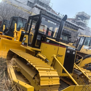 รถตักล้อยางแคตเตอร์พิลลาร์ รุ่น D4C พร้อมใบมีดและรางตีนตะขาบ สีเหลือง อุปกรณ์ก่อสร้าง น้ำหนักบรรทุก 7 ตัน กำลัง 60 กิโลวัตต์ - Product Image 4