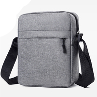 Sac bandoulière bleu pour homme, résistant à l'eau, en tissu Oxford, avec poche avant zippée, sac messager pour le quotidien et les voyages