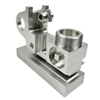 Bloc de base mécanique complexe en aluminium usiné sur mesure par tournage et fraisage CNC, multi-cavités filetées ±0,01 mm pour applications industrielles hydrauliques