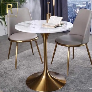 Tavoli <span class=keywords><strong>da</strong></span> <span class=keywords><strong>pranzo</strong></span> con base in <span class=keywords><strong>oro</strong></span> con piano in <span class=keywords><strong>marmo</strong></span> bianco rotondo di lusso popolare moderno tavoli <span class=keywords><strong>da</strong></span> <span class=keywords><strong>pranzo</strong></span> rotondi con piano in pietra per hotel - Product Image 3