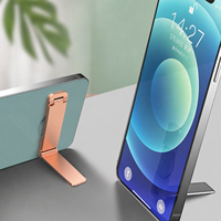 Support de téléphone universel pliable, adhésif, en alliage de zinc, support réglable portable pour smartphone, support de bureau