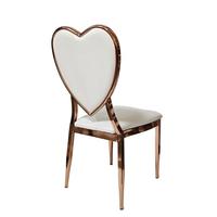 Chaise en métal or rose avec dossier en forme de cœur en PU blanc pour mariage