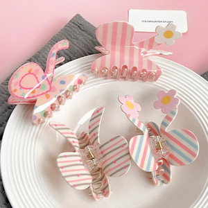 Ventes chaudes : Accessoires pour cheveux en plastique mignons et doux, pinces à cheveux en forme de nœud de couleur bonbon pour les occasions festives - Product Image 4