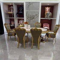 Table de salle à manger ovale massif, sur piédestal, ornée, artisanale, brillante, en bois de burl noble, de style traditionnel et patrimoniaux, pour galas, événements et réceptions