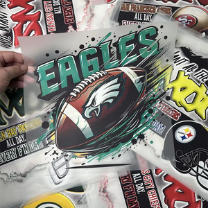 تيشيرتات مخصصة عالية الجودة مع شعار نقل Dtf تصاميم ملصقات طباعة نقل الحرارة الحديد على ملصقات 32 فرق - Product Image 6