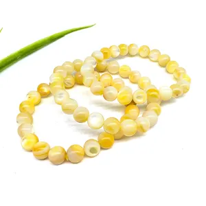 Wholesale Natural Golden shell pear bracelets yellow flash crystal jewelry 8mm 10mm Round Beads for women and gifts