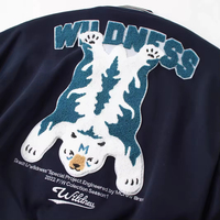 Veste universitaire streetwear patchwork personnalisée avec boutons-pression, col et poignets côtelés, poches avant, marque privée
