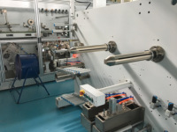 Machine à plastifier servo complète à l'état neuf pour la ligne de production de couches pour bébés machines de fabrication de produits en papier
