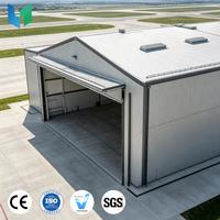 Hangar préfabriqué moderne en structure acier pour avions privés, haute capacité de charge, pour stockage aéronautique de luxe et lieux sportifs