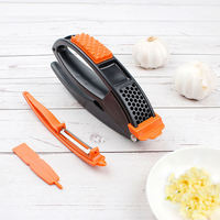 3-in-1 multifunctionele knoflookpers, handmatige knoflookhakker met groenteschiller en reinigingsgereedschap, keukenaccessoire