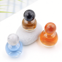 Vente en gros d'usine 30 50 80ml Flacons de parfum de luxe en verre cosmétique Flacons vides sphériques transparents avec bouchon à bille