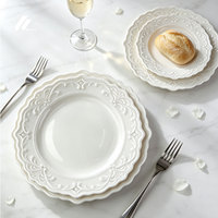 Service de table en porcelaine blanche à motif floral en relief, style vintage français, assiettes et bols en céramique, personnalisation du logo, vente en gros
