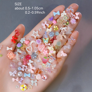 Venta al por mayor 600 piezas/bolsa de diamantes de imitación 3D Aurora <span class=keywords><strong>Rosa</strong></span> Mixto <span class=keywords><strong>con</strong></span> lazo y flor para <span class=keywords><strong>uñas</strong></span>, dijes de resina bonitos a granel sin pegamento para <span class=keywords><strong>uñas</strong></span> acrílicas DIY - Product Image 2