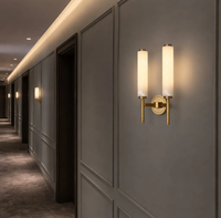 Applique murale LED haut de gamme en pierre naturelle à double tête, finition cuivre massif, style nordique cylindrique en albâtre pour villa