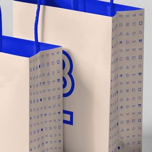 Sac de shopping en papier enduit pliable biodégradable personnalisé avec votre propre logo pour les magasins de détail de vêtements et de chaussures - Product Image 4