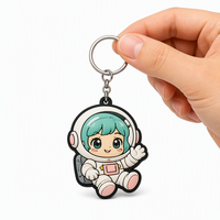Ecologisch verantwoorde dubbelzijdige geprägte astronaut PVC sleutelhanger voor zakelijke promotionele evenementen, weggeefacties en feestpakketten