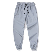 Pantalon Hip-hop Lumineux Unisexe Taille Européenne Personnalisable avec Logo Réfléchissant Imperméable Léger Teint Uni pour Danse de Nuit et Streetwear