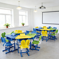 Ensemble de bureau et chaise ergonomiques modernes et collaboratifs de haute qualité, forme trapèze, pour la maternelle et les classes primaires