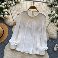 Chemisier élégant à manches longues orné de perles pour femme, style chic français, idéal pour l'automne