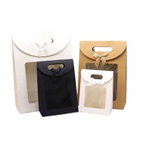 Vente en gros de coffrets cadeaux de luxe faits à la main en ivoire personnalisés Design pliable de qualité supérieure Poignée de ruban de logos personnalisés pour Noël