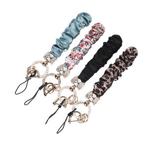 Llavero con Correa para Muñeca, Diseño de Moño con Brillantes y Diamantes de Imitación, para Teléfono <span class=keywords><strong>Celular</strong></span> o Smartphone - Product Image 1