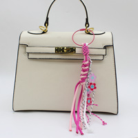 Porte-clés tressé fait main en corde de polyester colorée, pendentif de sac, accessoires de bijoux tendance