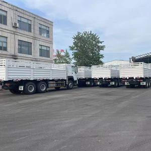 Sinotruk HOWO 371HP 6*4 Sidewall Drop Flatbed Lori 10 Wheeler papan pagar kotak truk kargo dengan Trailer penuh untuk Ethiopia - Product Image 1